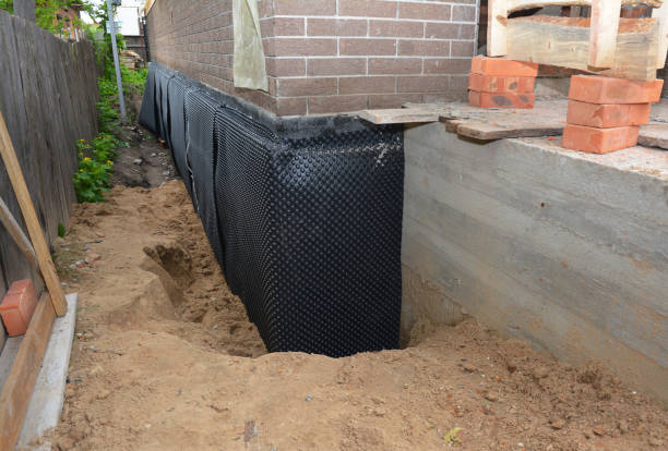 Happy homeowners after waterproofing job in Campbellsport